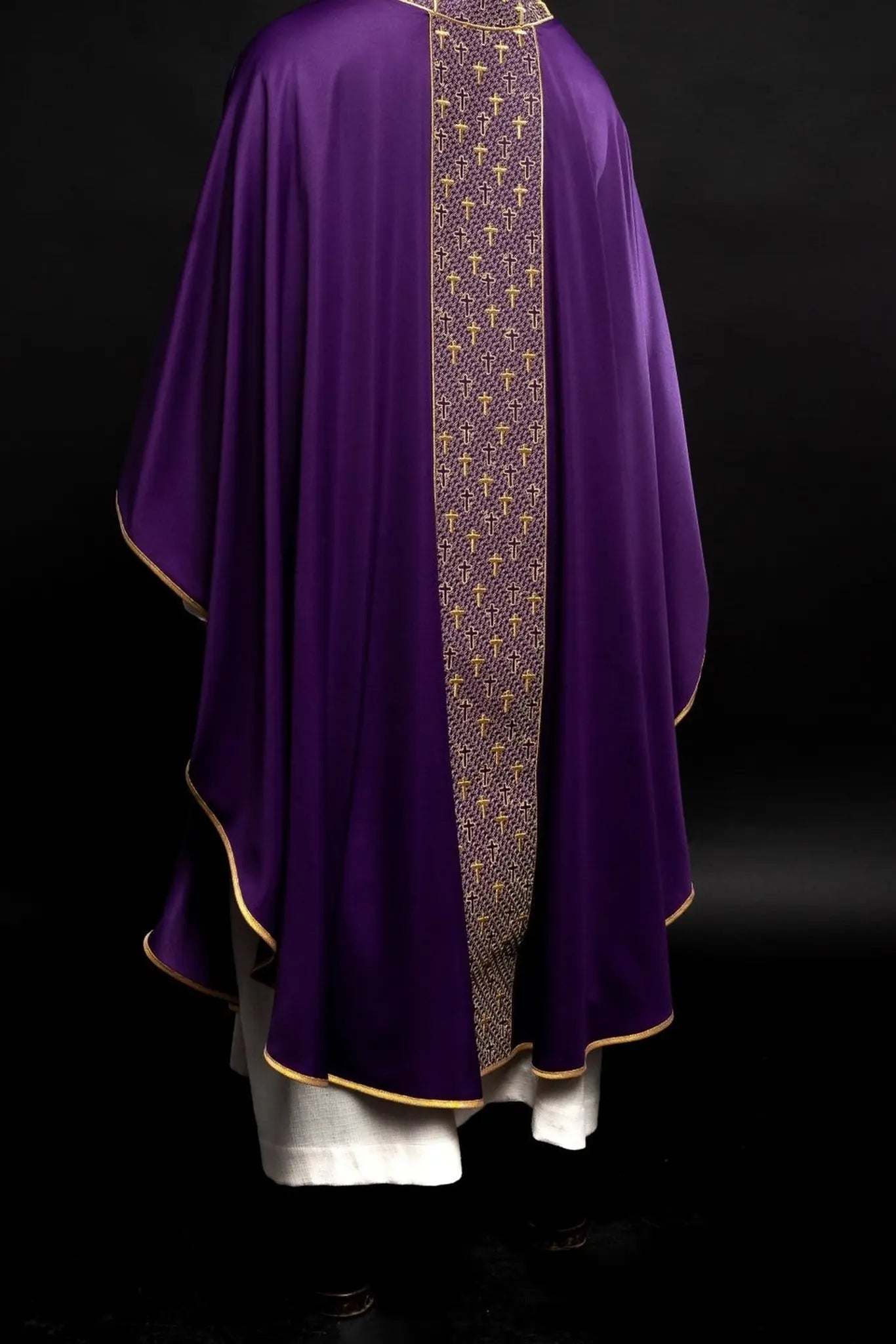Chasuble with richly embroidered belt with crosses in purple color