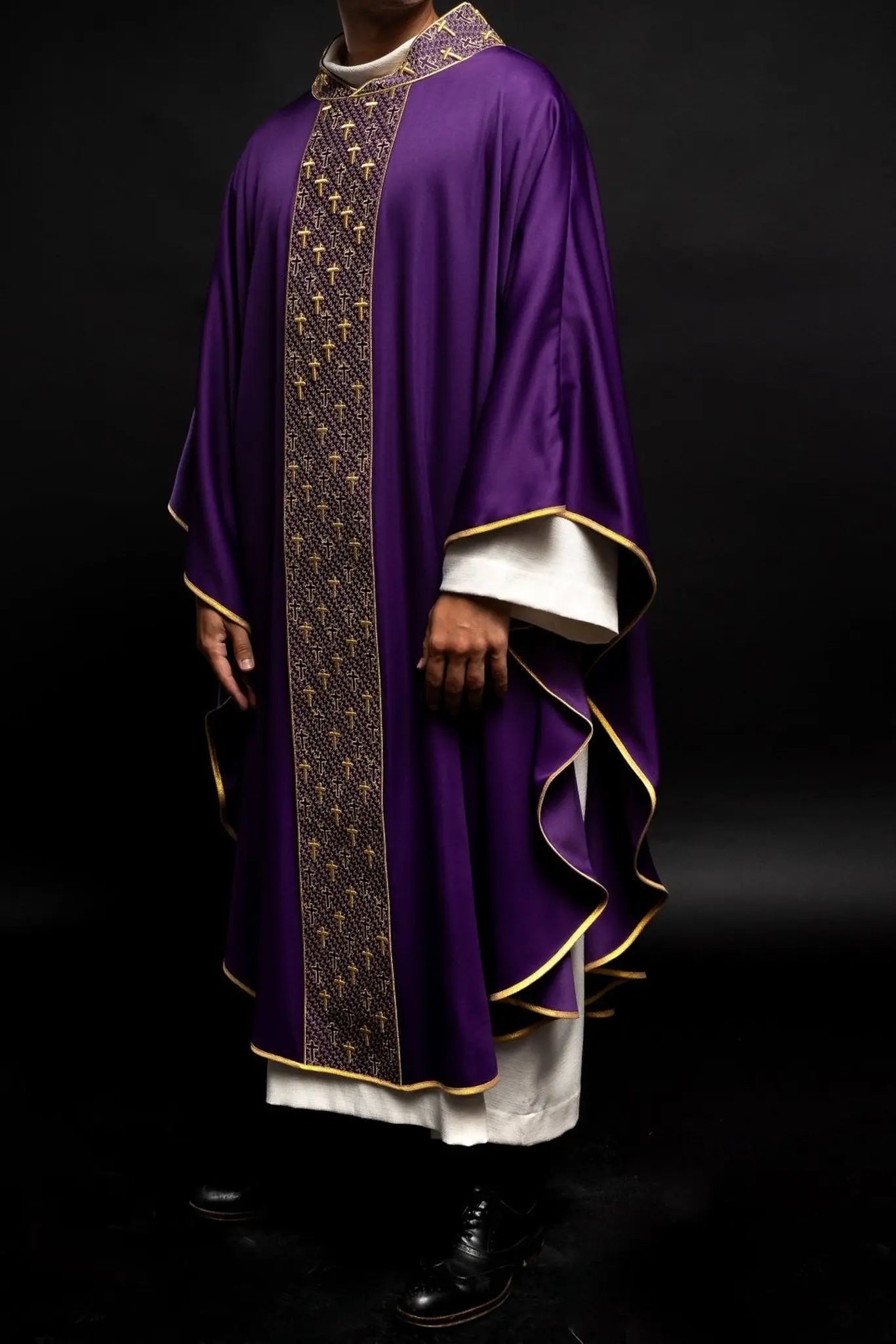 Chasuble with richly embroidered belt with crosses in purple color