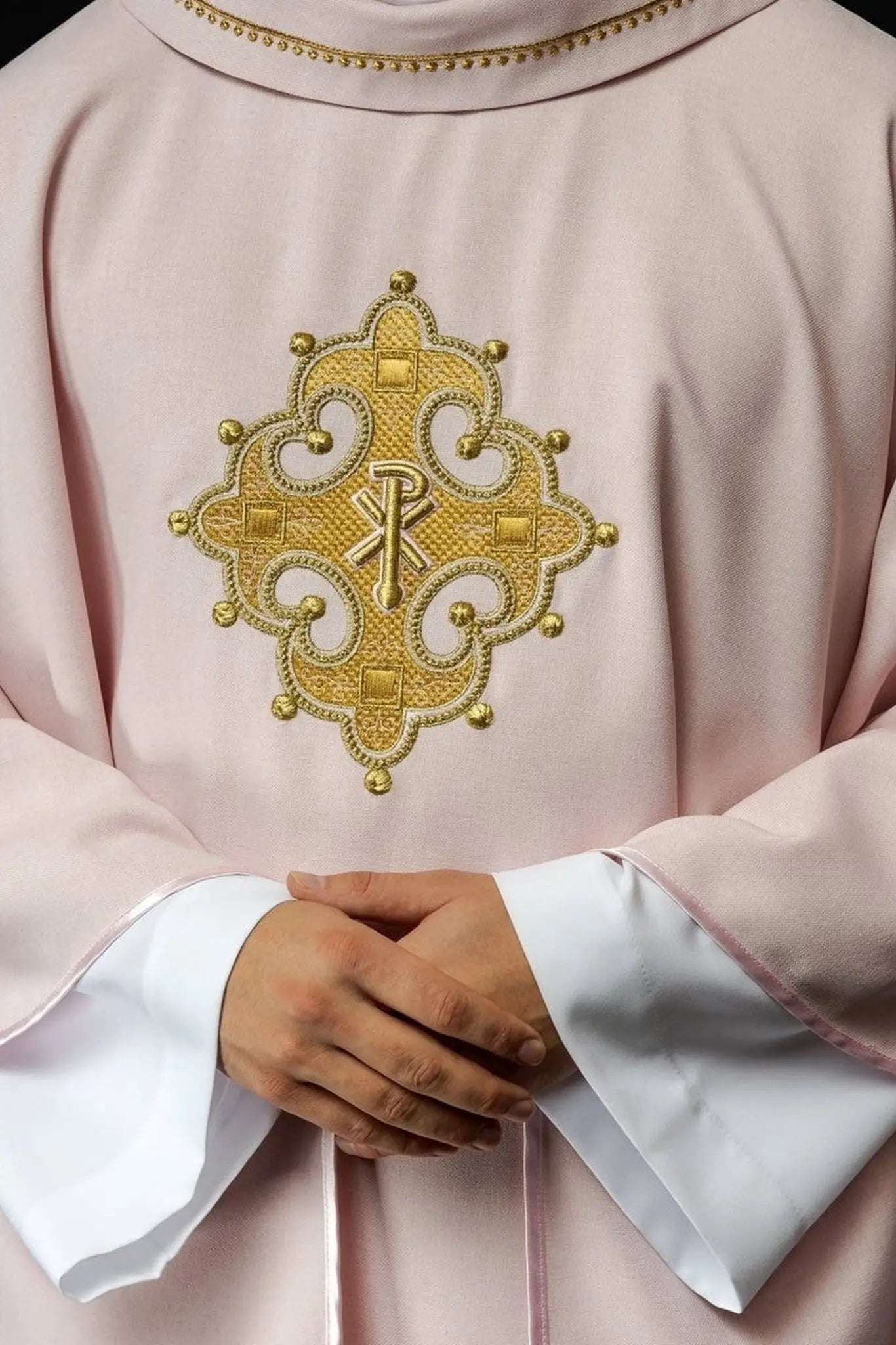 Chasuble with embroidered cross and gold trim on collar in rose color
