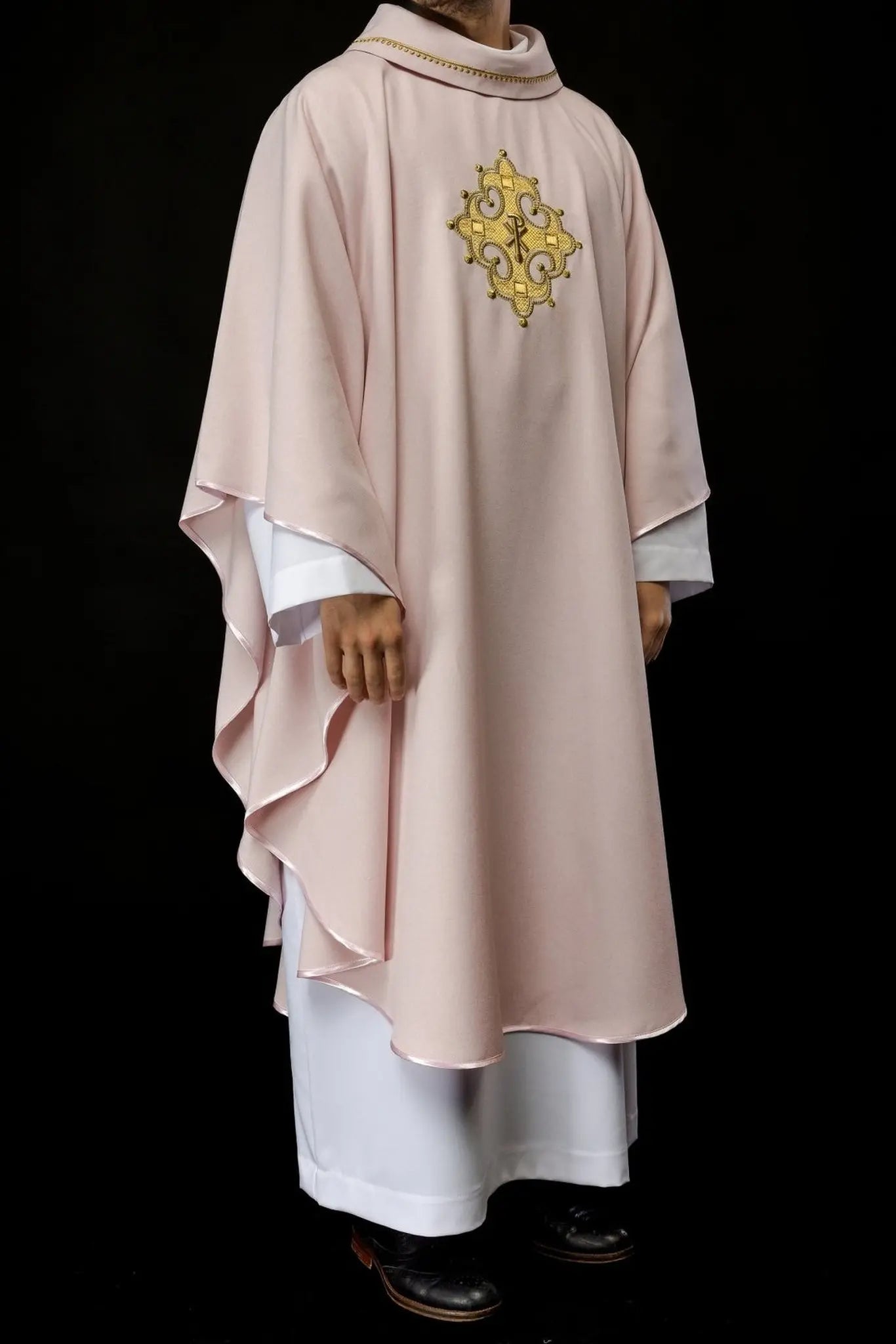 Chasuble with embroidered cross and gold trim on collar in rose color