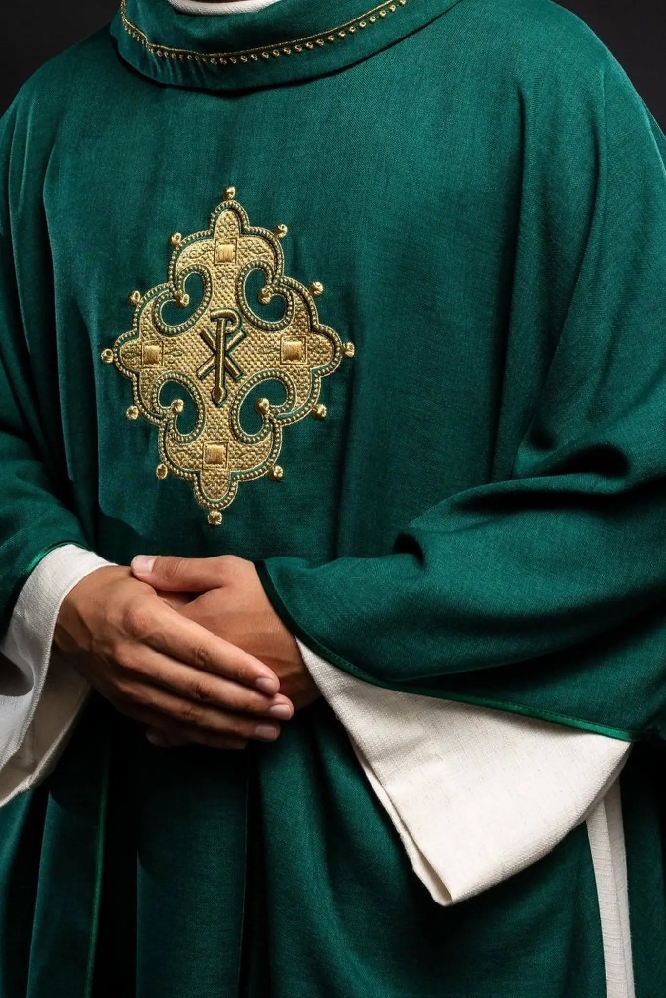 Chasuble with embroidered cross and gold trim on collar in green