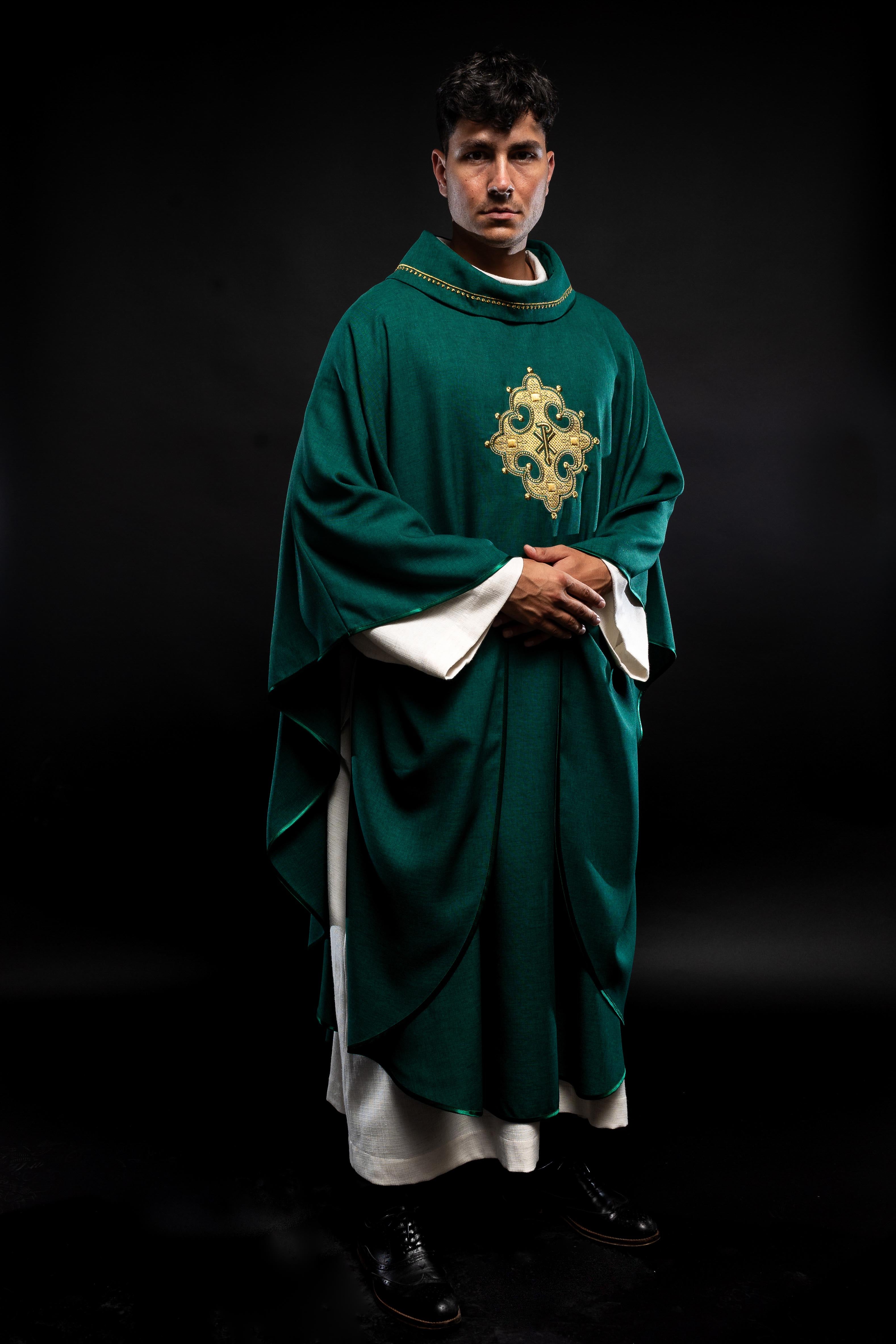 Chasuble with embroidered cross and gold trim on collar in green