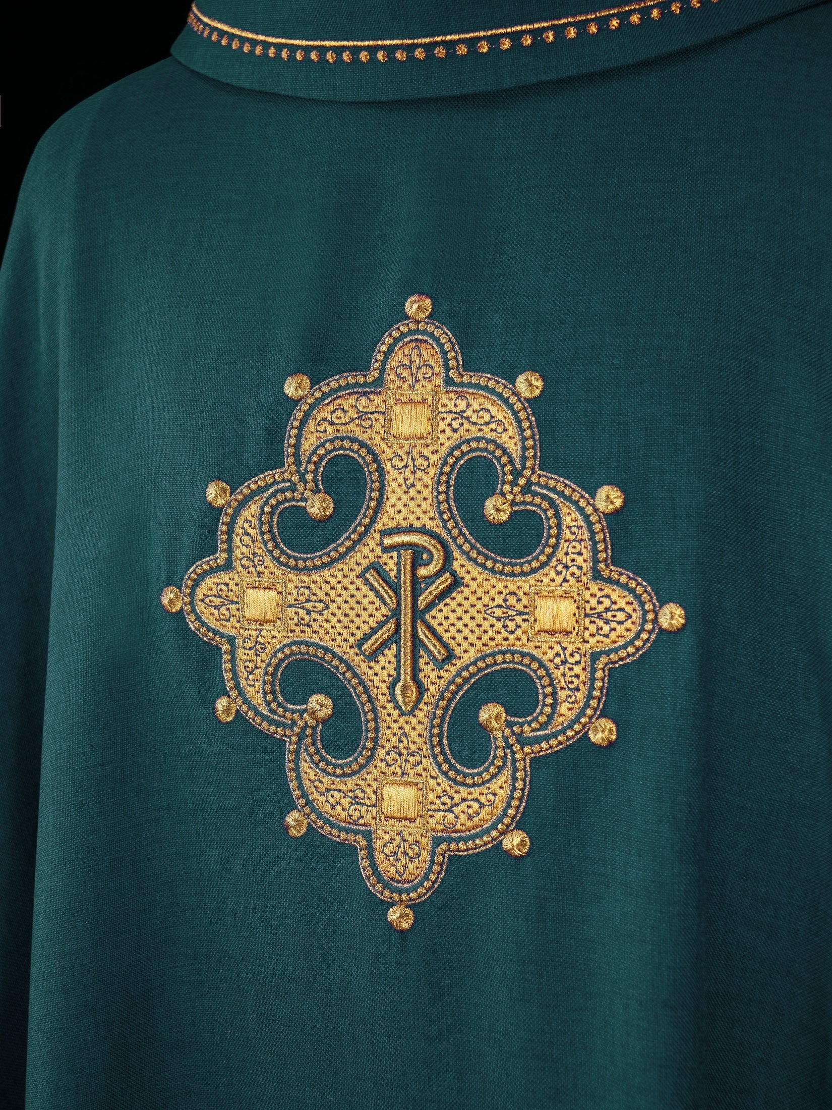 Chasuble with embroidered cross and gold trim on collar in green