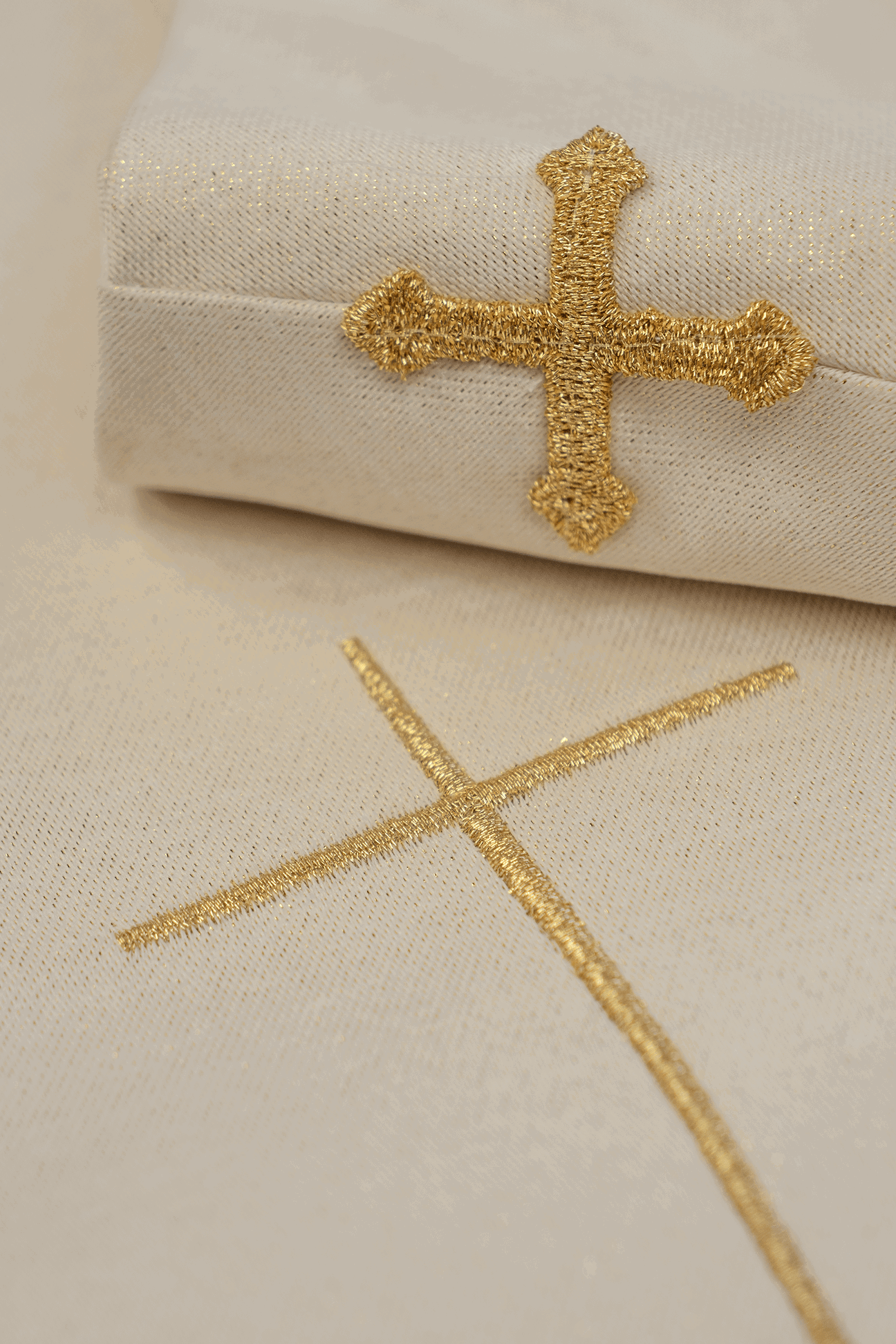 Shimmering fabric chasuble with rich gold embroidery on the belt