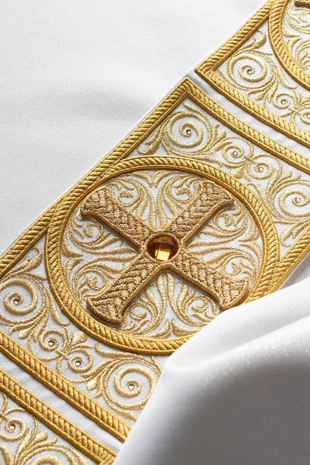 Gold chasuble richly embroidered decorated with stones