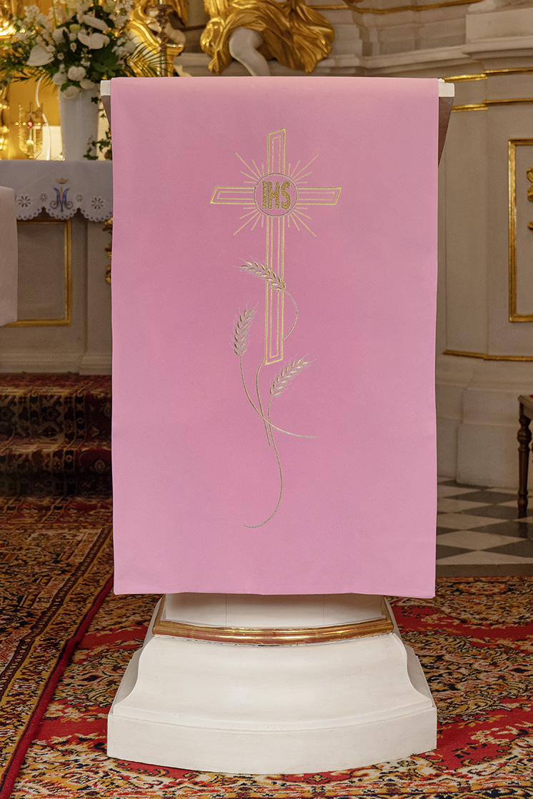 Pink tablecloth for lectionary embroidered motif of the cross and IHS