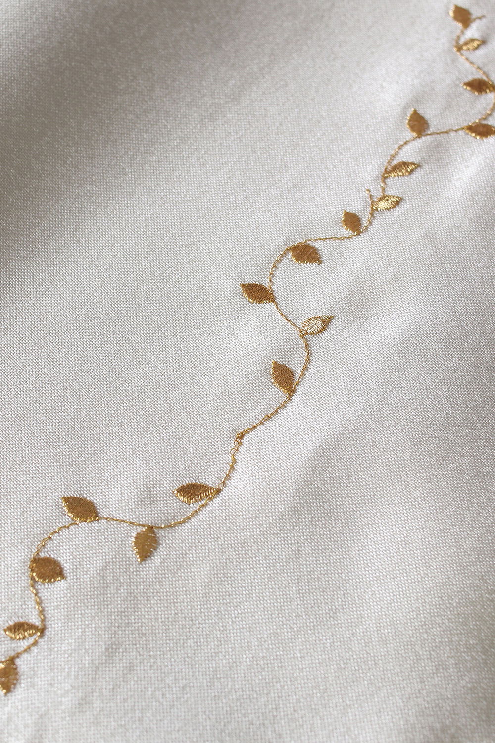 Embroidered ecru cross veil