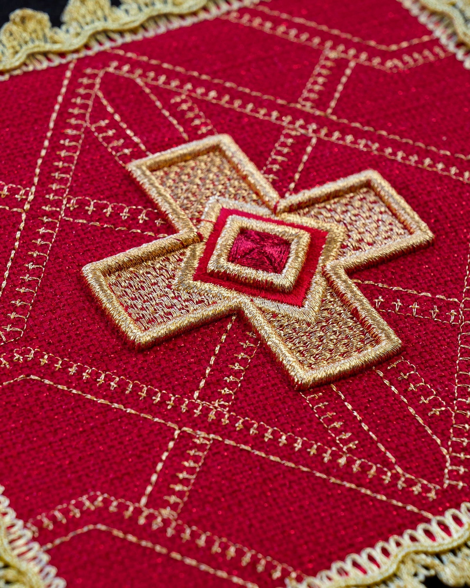 Set of four stakes with gold embroidery