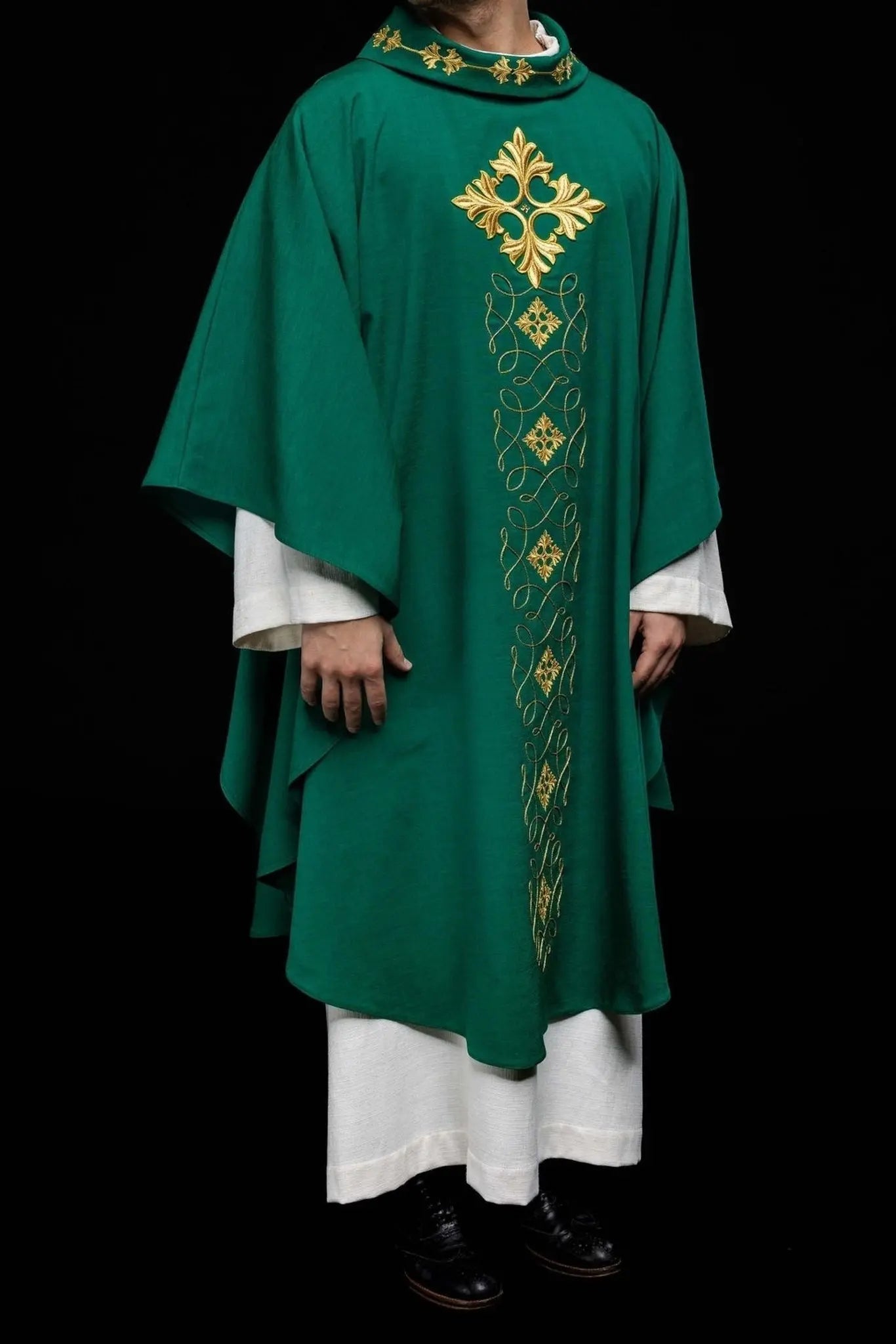 Green chasuble richly embroidered with string and stones