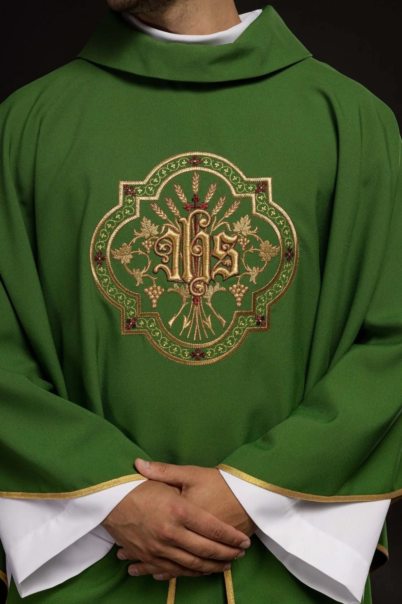 Green chasuble with IHS and PAX embroidery