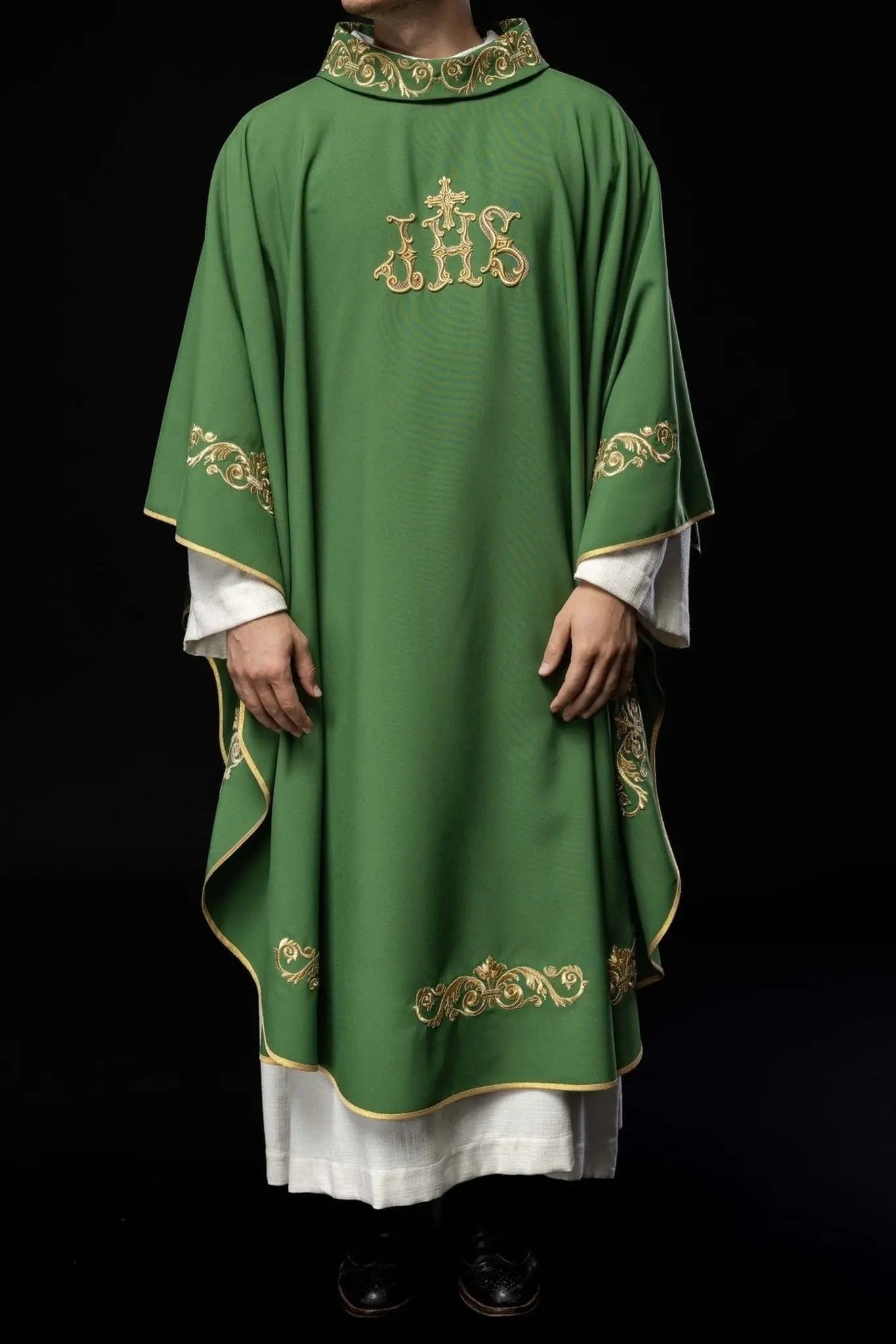 Green chasuble with gold IHS embroidery and decorative trim