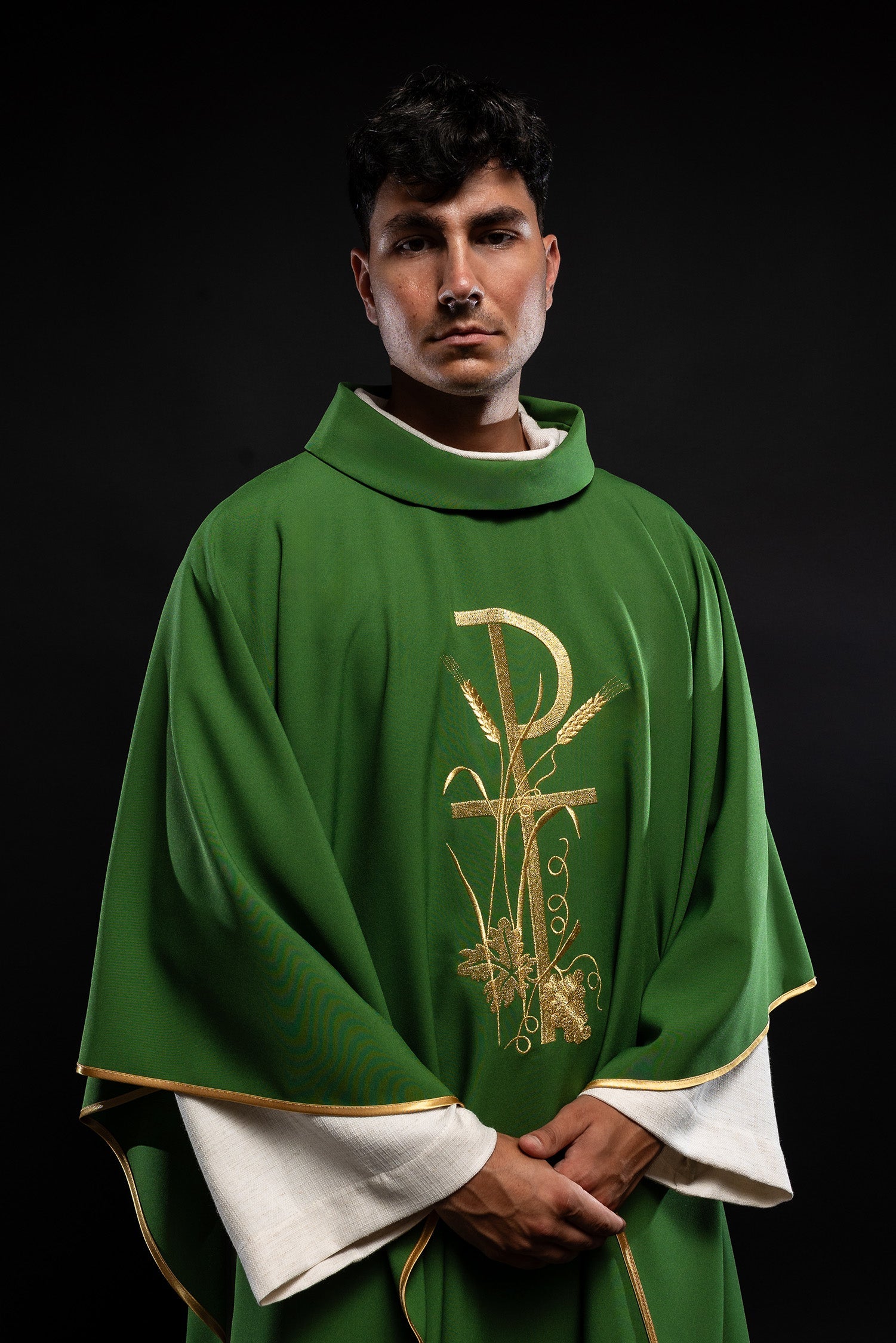 Green chasuble with gold cross embroidery