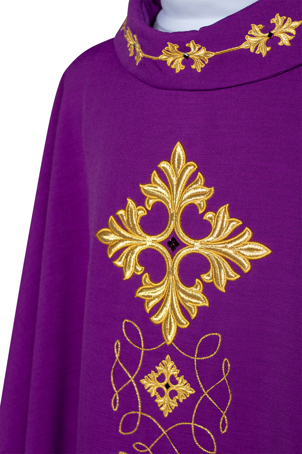 Purple chasuble richly embroidered with string and stones